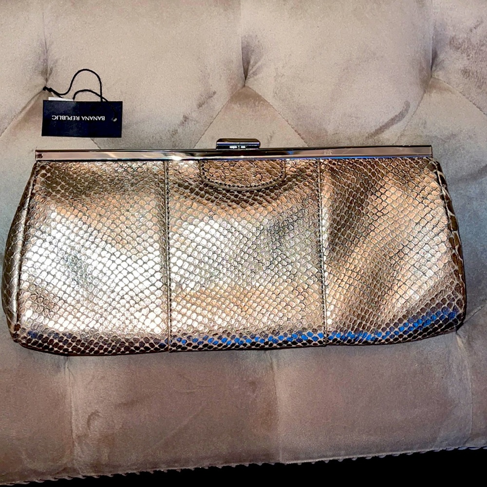Snake print metallic clutch
